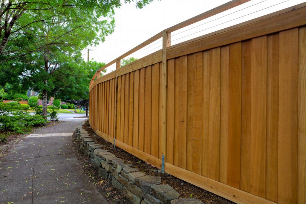 tall wood fence of the house